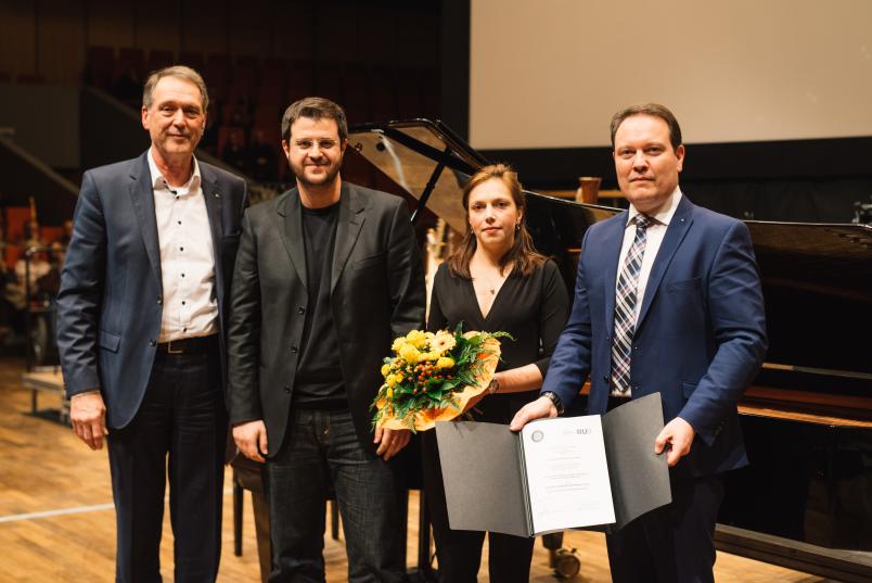 Gruppenbild mit vier Personen