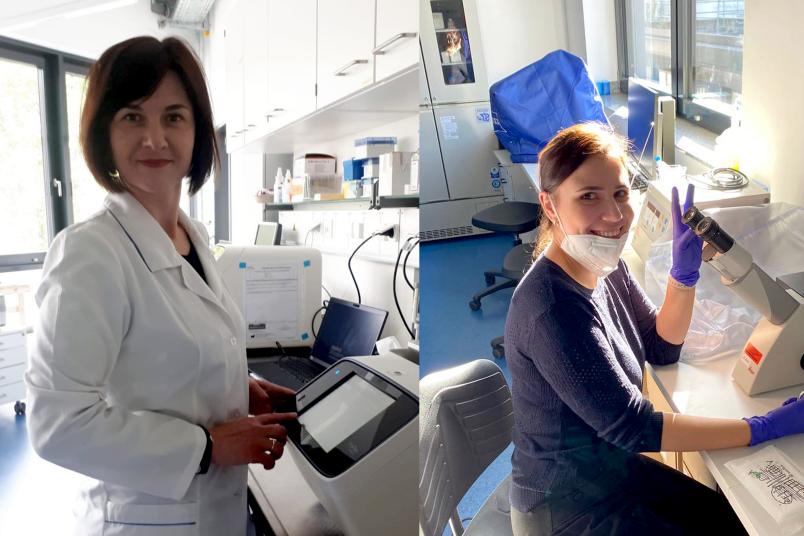 Yulia Klys is standing in a labratory in a white coat, looking friendly into the camera. Yulia Osadchuk is sitting on a microscope in a labratory, showing the "peace"- sign with her hand, smiling.